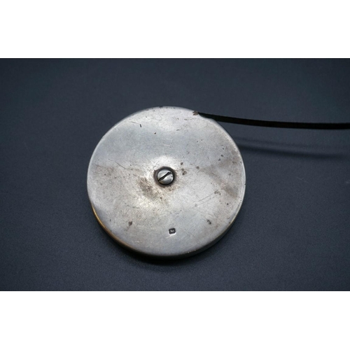 609 - An Edwardian silver cased tape measure, by William Comyns & Sons, Sheffield 1905, 71mm diameter.... 