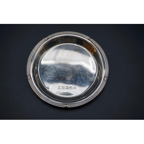 610 - A Victorian silver pin dish, by William Summers, London 1889, 9.5cm; together with a pair of modern ... 