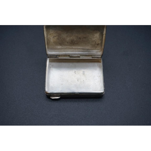 614 - A small group of silver and white metal items, to include a silver vesta case. (9)