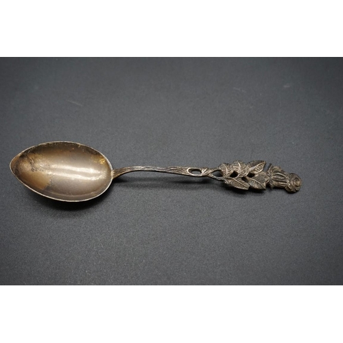 623 - Six German metal spoons, one stamped Antiko 800.