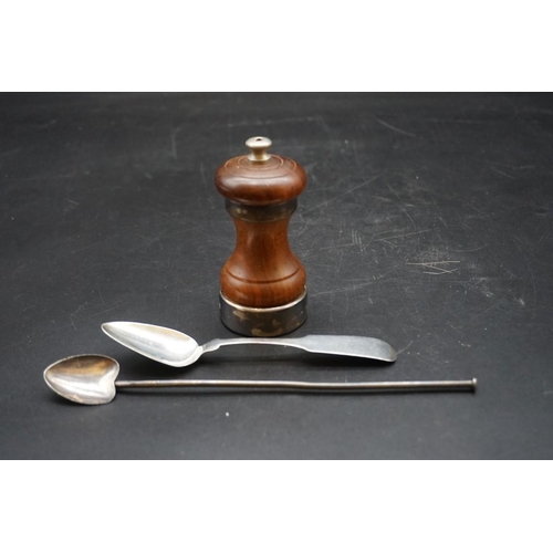 631 - A silver mounted turned wood pepper mill; together with a metal mate spoon; and a Hill & Ross Co... 