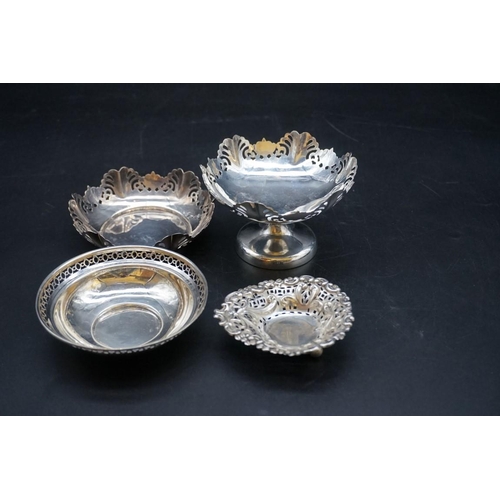 632 - Four silver bonbon dishes, largest 11cm diameter, 249g.