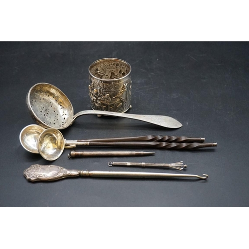 639 - A quantity of white metal and other metal items, to include; a continental sifter ladle; two baleen ... 