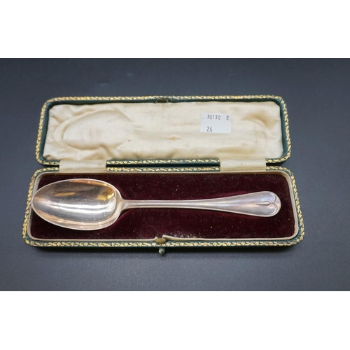 645 - A cased silver christening fork and spoon; together with a cased silver christening spoon; and anoth... 