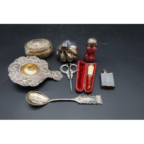 648 - A Swedish cesons spoon; together with a silver strainer; and other silver and silver mounted items, ... 