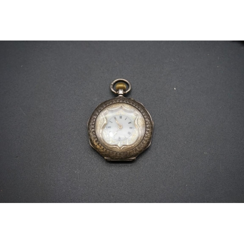 656 - A quantity of silver and silver mounted items; together with a silver fob watch and a British milita... 