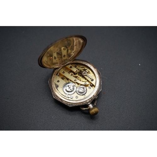 656 - A quantity of silver and silver mounted items; together with a silver fob watch and a British milita... 