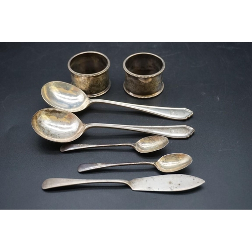 664 - A pair of Victorian silver napkin rings, by Robert Pringle & Sons, London 1900; together wi... 