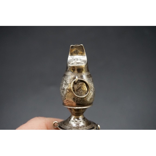 667 - A George III silver baby's rattle and whistle, having coral teether, by Edward Mayfield, London 1804... 