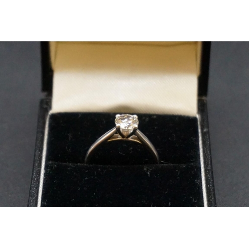 680 - An 18ct white gold solitaire ring, set brilliant cut diamond of approx 0.5ct, size M1/2, gross weigh... 