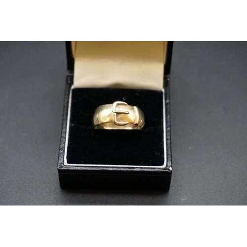 701 - A 9ct gold buckle ring, 3.6g, size R1/2.