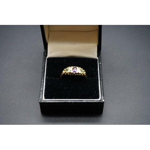 731 - A Suffragette style 18ct gold ring, London 1966, set amethyst, peridots and diamonds, size O1/2, gro... 