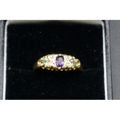 731 - A Suffragette style 18ct gold ring, London 1966, set amethyst, peridots and diamonds, size O1/2, gro... 