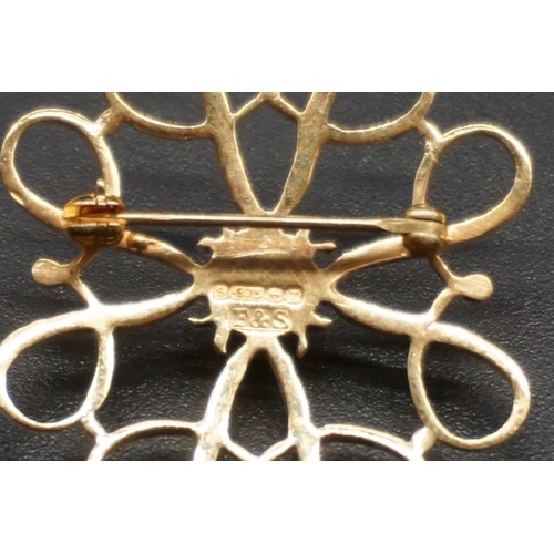 747 - Two 9ct gold openwork floral brooches, one set a diamond to centre and the other set a sapphire to c... 