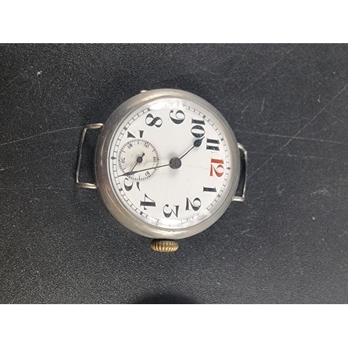 972 - Three various WWI silver manual wind trench watches; together with another silver wristwatch. (4)... 