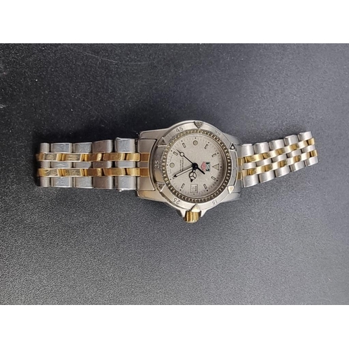 981 - A circa 2001 Tag Heuer 1500 series stainless steel and gold plated ladies quartz wristwatch, 28mm, R... 