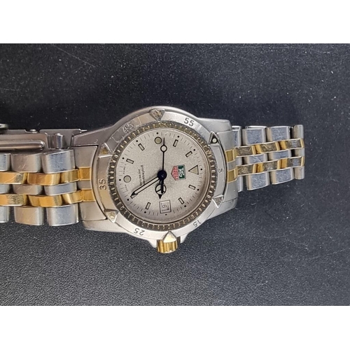 981 - A circa 2001 Tag Heuer 1500 series stainless steel and gold plated ladies quartz wristwatch, 28mm, R... 