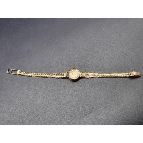 993 - An H Samuel yellow metal quartz ladies wristwatch, stamped 585.