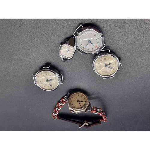 999 - A vintage silver ladies silver wristwatch; and four vintage plated ladies wristwatches. (5)... 