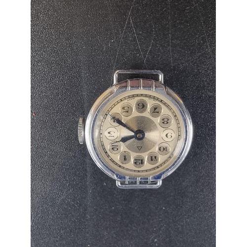 999 - A vintage silver ladies silver wristwatch; and four vintage plated ladies wristwatches. (5)... 