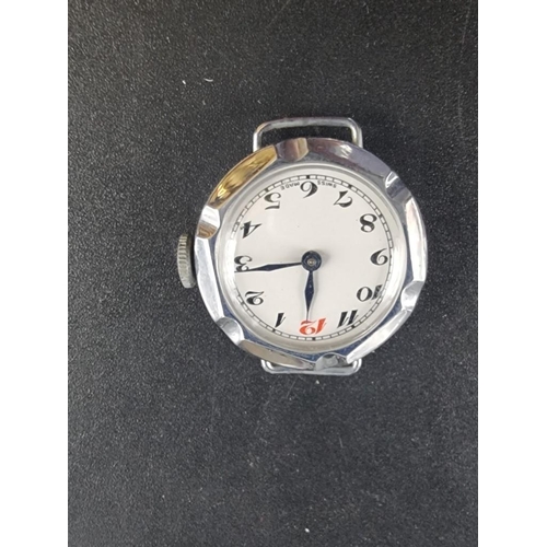 999 - A vintage silver ladies silver wristwatch; and four vintage plated ladies wristwatches. (5)... 