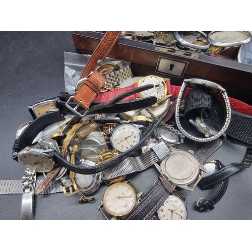 999O - A quantity of watches and watch parts.