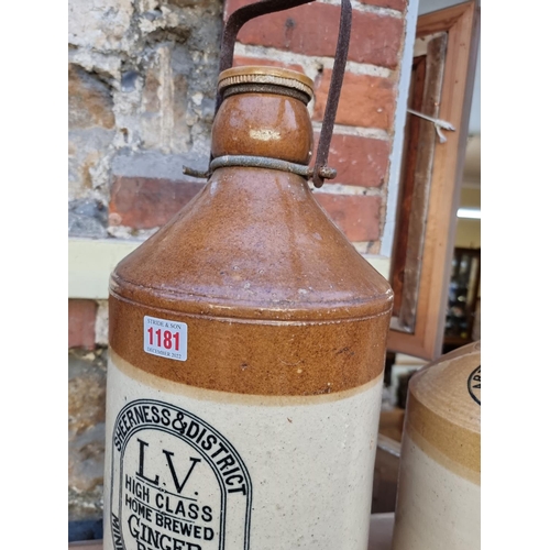 1181 - An antique stoneware bottle, inscribed 'Sheerness & District', 56cm high; together with another ... 