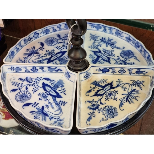 1284 - A Villeroy and Boch blue & white four piece hors d'oeuvres set, on ebonized stand, 34cm diameter... 