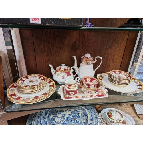 1285 - A Royal Albert 'Lady Hamilton' pattern part tea and coffee service; together with a further small qu... 