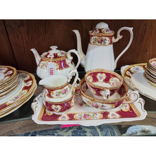 1285 - A Royal Albert 'Lady Hamilton' pattern part tea and coffee service; together with a further small qu... 