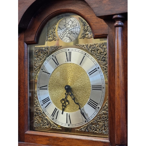 1288 - A reproduction mahogany longcase clock, 196.5cm high, with pendulum and three weights. ... 