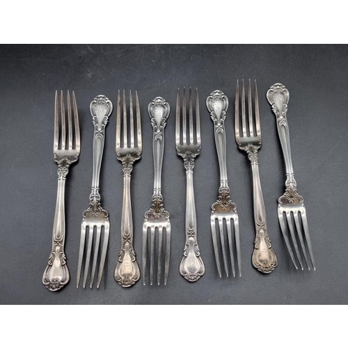 567 - A set of eight American white metal table forks, stamped 'Pat 1895 Sterling, T C Tanke'.... 