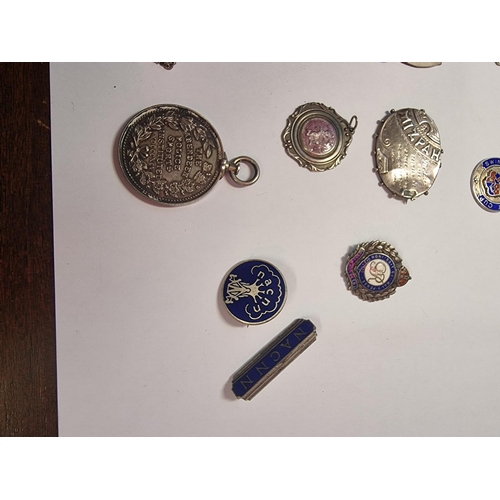 476 - A WWII silver ARP badge; together with five other silver badges and medals; a silver Mizpah brooch; ... 