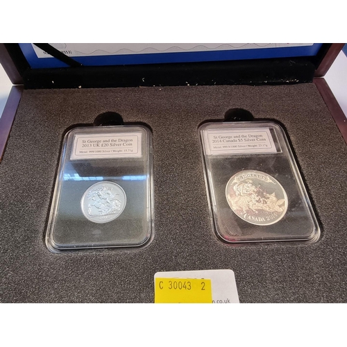 489 - Coins: a cased limited edition Bradford Exchange St George and Dragon two coin silver set, of .999 s... 