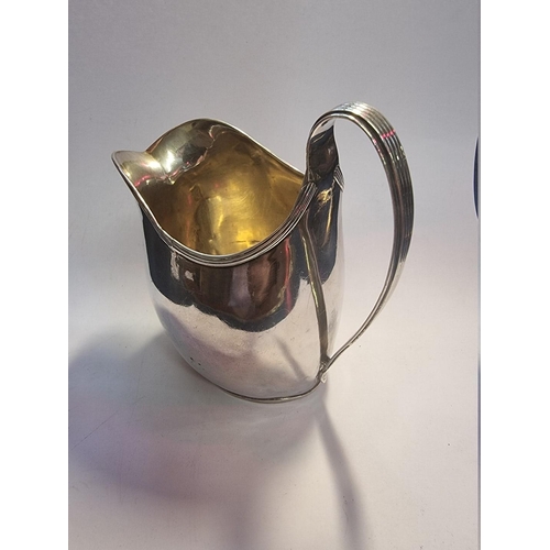 522 - A large George III silver milk jug, London 1797, 13.5cm high, 207g.