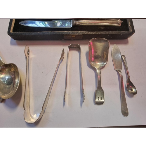 559 - A cased set of six silver handled tea knives; together with a Victorian silver fiddle pattern caddy ... 