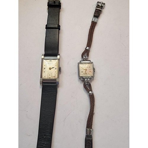 998D - A vintage Paul Buhre stainless steel manual wind wristwatch, on replacement black leather strap; tog... 