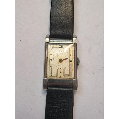 998D - A vintage Paul Buhre stainless steel manual wind wristwatch, on replacement black leather strap; tog... 