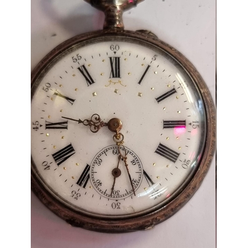 998Q - A continental white metal stem wind open face pocket watch, 44mm, stamped 800.