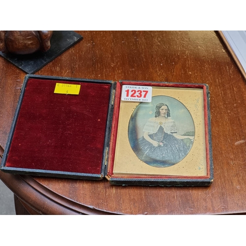 1237 - A mixed lot, to include a leather cased Daguerreotype photograph, 12.5 x 9.5cm. (5)