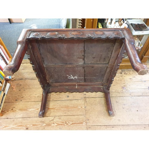 1299 - A Chinese carved hardwood low square table, 19th century, 75.5cm wide.