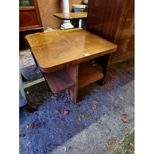 1065 - An Art Deco walnut occasional low table, 61cm wide.