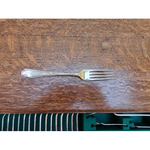 1021 - A 1920s oak cased canteen of EPNS cutlery, by Walker & Hall, 68cm wide.   ... 