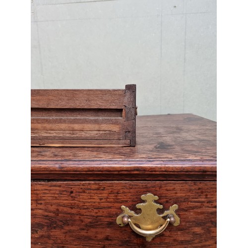 1026 - An 18th century oak panelled chest of drawers, 87cm wide.   ... 