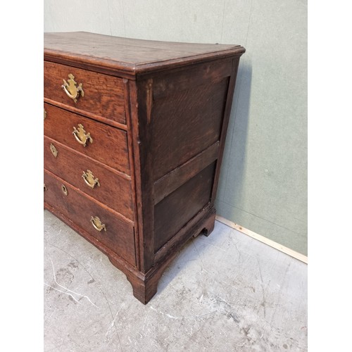 1026 - An 18th century oak panelled chest of drawers, 87cm wide.   ... 