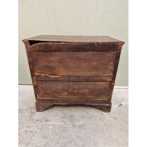 1026 - An 18th century oak panelled chest of drawers, 87cm wide.   ... 