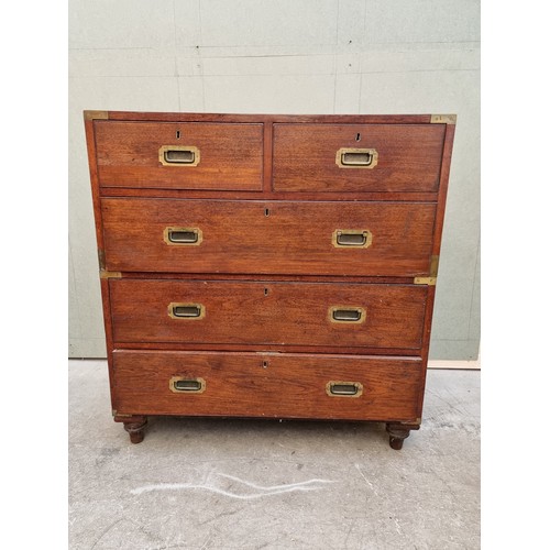 1077 - An antique teak and brass bound campaign chest, labelled 'Manufactured by S W Silver & Co,...Lon... 