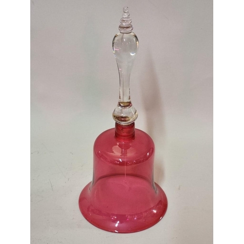 1401 - A good pair of cranberry flashed cut glass decanters and stoppers, 30.5cm high; together with a cran... 