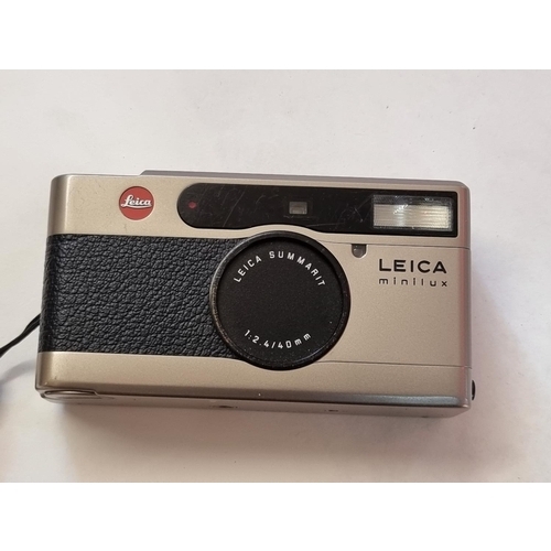 1327 - Camera: a Leica Minilux film camera, with leather case.