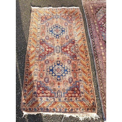 1002 - Three small rugs, 175 x 88.5cm; 147 x 80cm; and 150 x 107cm. (3)